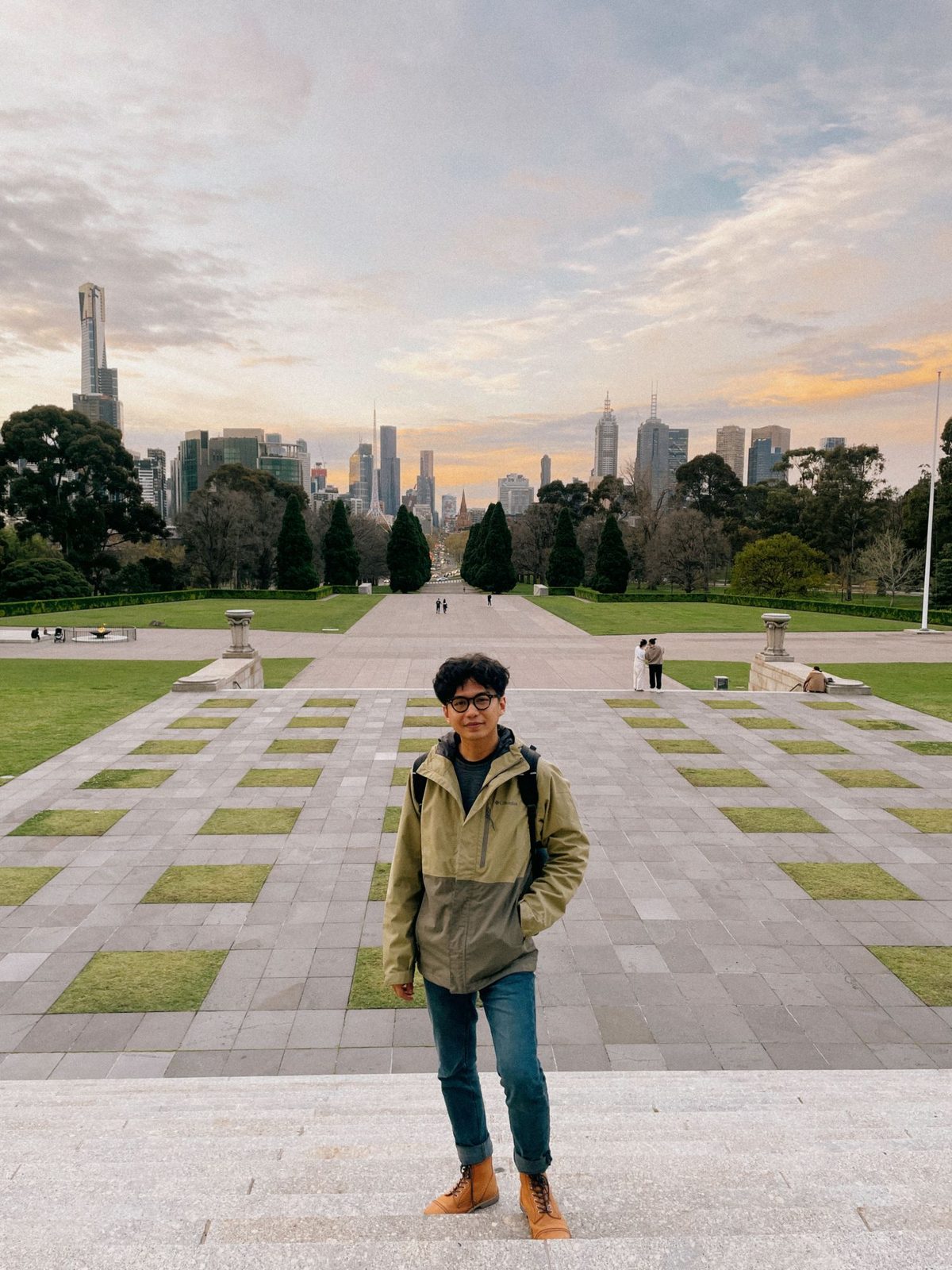 Ronaldo on the steps of the Shrine of Remembrance, the Melbourne skyline behind him at sunset