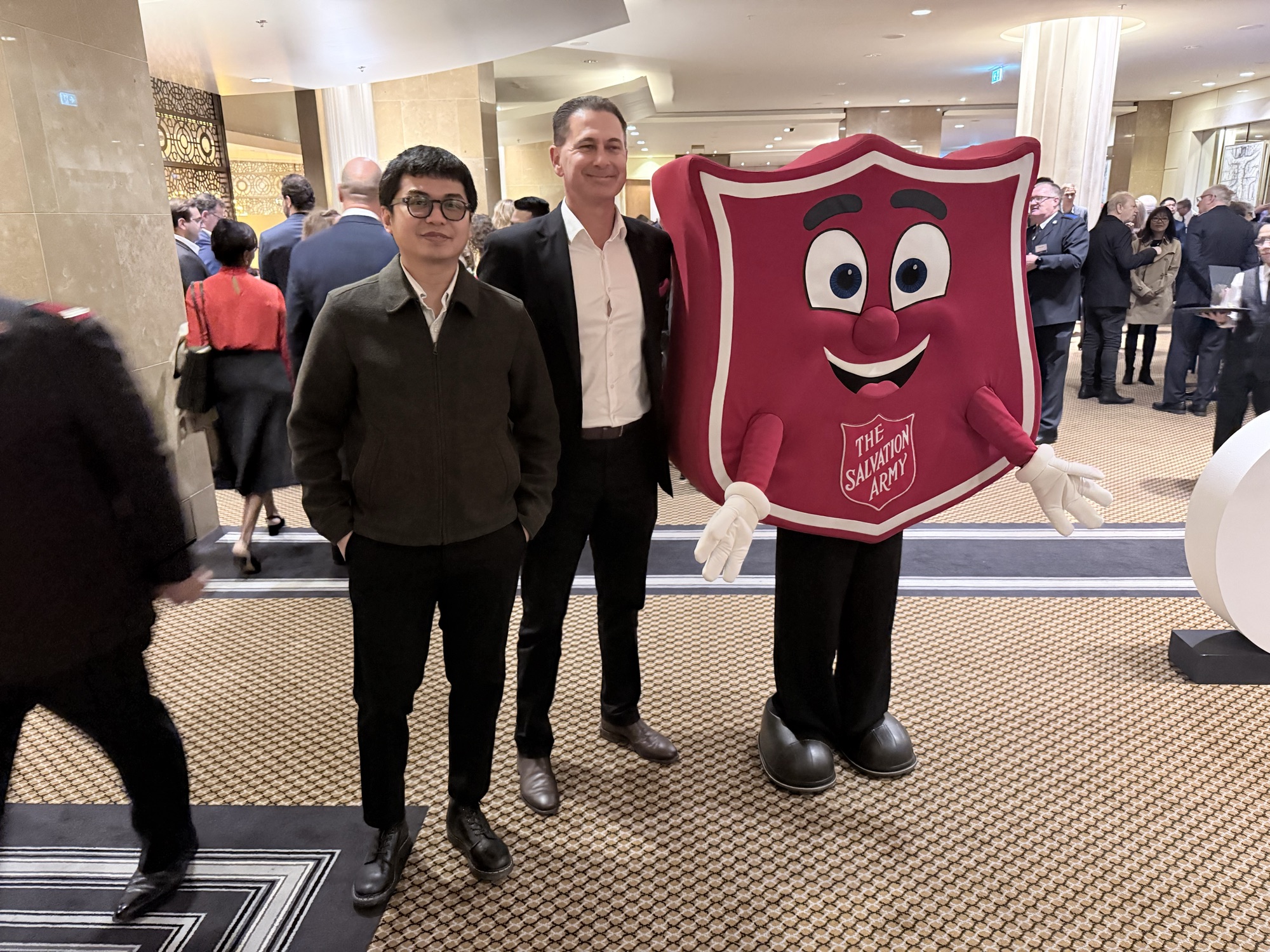 Ronaldo at the event with Charles Elena and the Salvation Army shield mascot